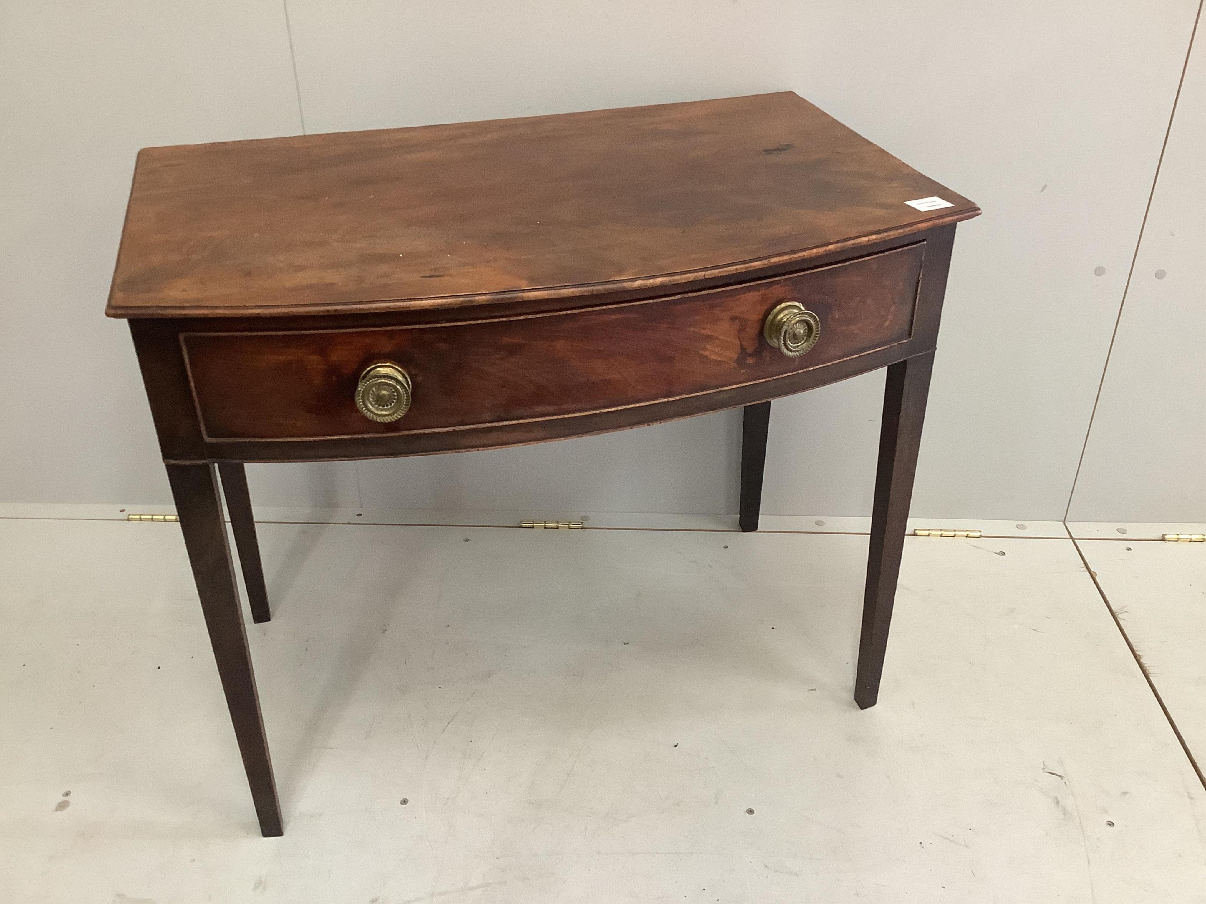 A George III mahogany bowfront side table, width 85cm, depth 53cm, height 71cm. Condition - fair